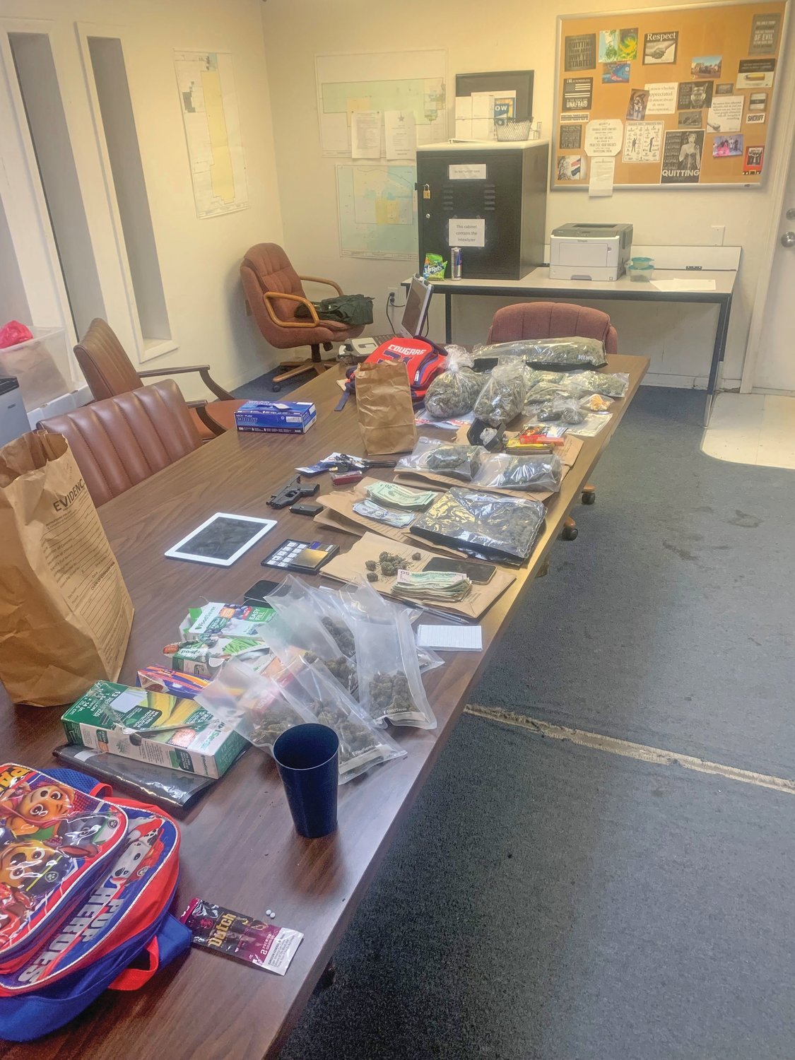 Deputies, along with the assistance of Investigators, located several bags of marijuana with a total weight of 4.1 pounds, 248 OxyContin pills, a handgun along with ammunition, electronic communication devices, a scale and packaging material for sale. Investigators also collected $3,339.00 in US Currency.